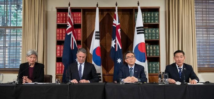Defense Minister Shin Won Sik (far right) is at a 