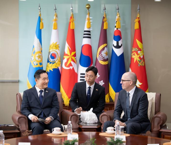 Minister of National Defense Shin Won Sik (left) c