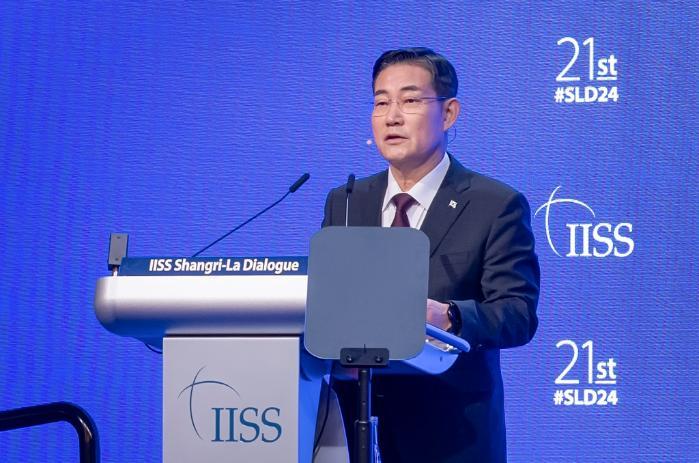Minister of National Defense Shin Won Sik gives a 