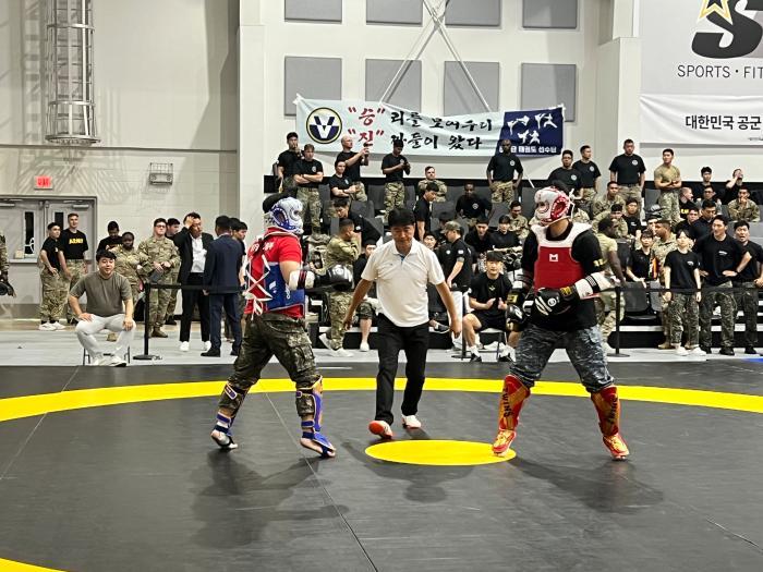 Athletes in the ROK/IU.S. friendship Taekwondo com