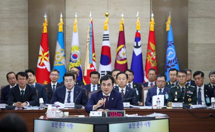 Defense Minister Ahn Gyu-back, center, answers que